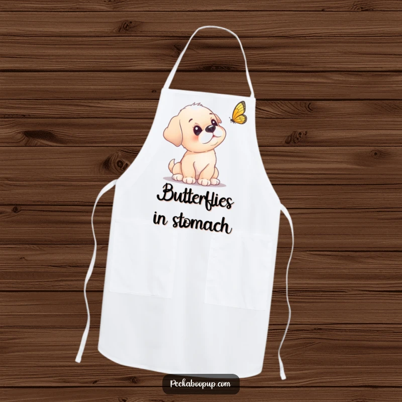 Funny puppy apron showing a curious puppy tilting its head at a fluttering butterfly.