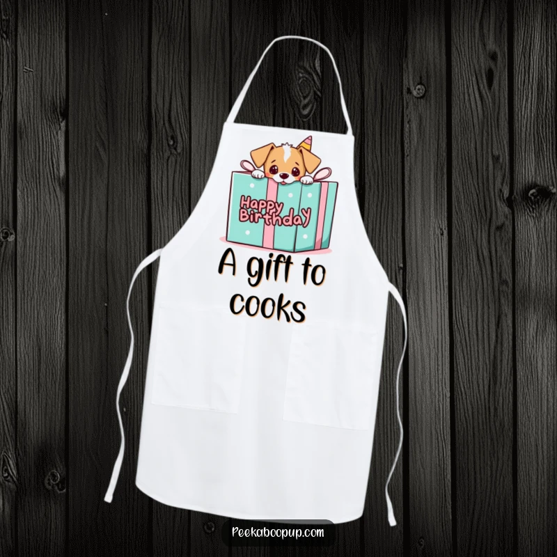 Funny apron featuring a puppy playfully peeking from a giant birthday gift box, ready for party fun.