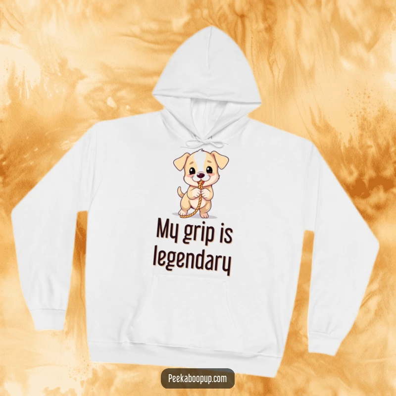 Funny puppy hoodie capturing a spirited puppy in a tug-of-war, designed for laughter and warmth.