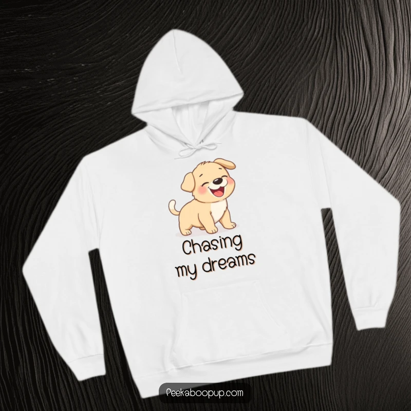 Funny giggling puppy chasing its tail, shown on a soft and cozy hoodie for ultimate comfort.