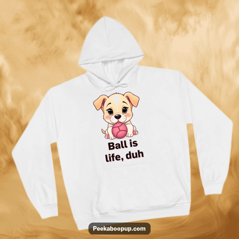Funny Hoodie showcasing a determined puppy about to nudge a ball, radiating playful curiosity and warmth.