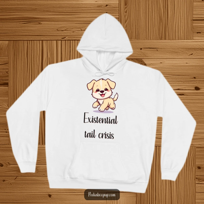 Funny hoodie featuring a playful puppy comically chasing its tail, depicted with a look of intense but happy concentration.