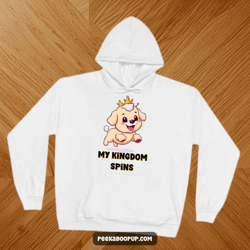 Funny hoodie with a cute puppy sporting a crown, enthusiastically chasing its tail with a wide, happy smile.
