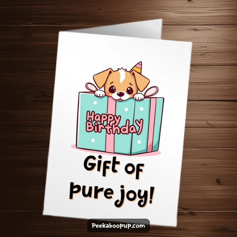 Funny Free Printable Birthday Card: Adorable puppy playfully peeking out from a huge, brightly wrapped birthday gift box.