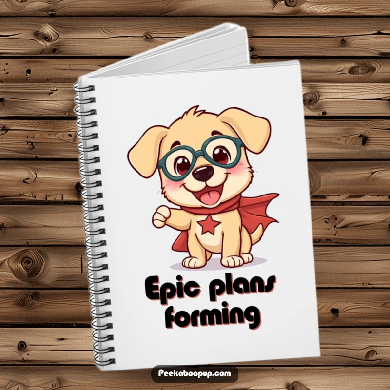 Funny notebook featuring a joyful puppy in a cape striking a comical superhero pose, ideal for writing.