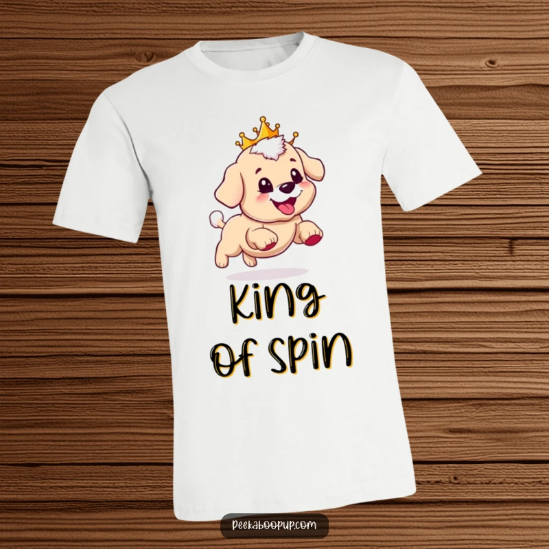 Funny t-shirt depicting a charming puppy wearing a crown, joyfully chasing its own tail with a big, happy grin.