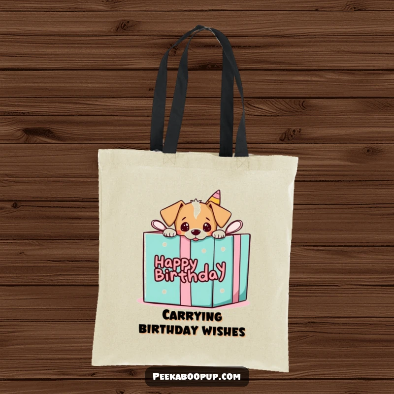 Funny tote bag showing a puppy playfully peeking from a huge birthday gift box, ready for celebration.