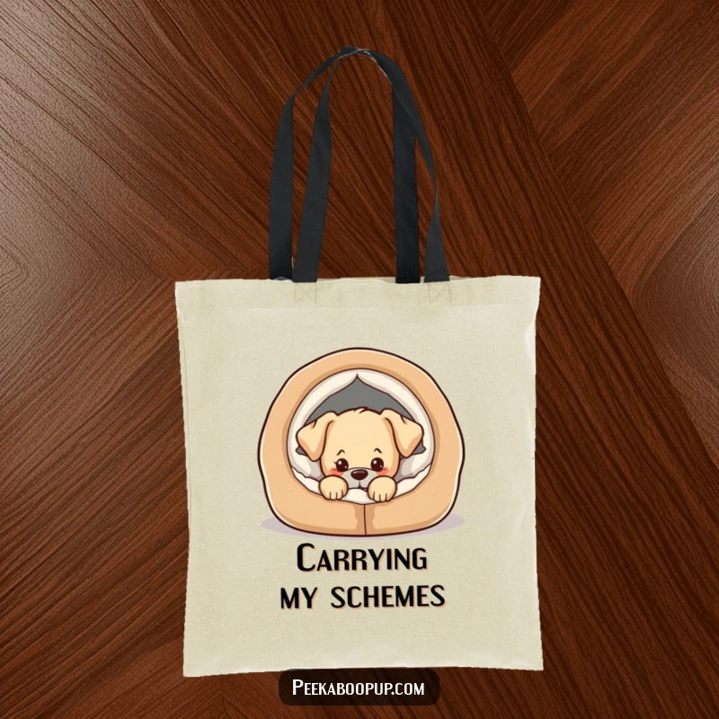Funny tote bag featuring a playful puppy peeking out from a cozy dog bed, looking mischievous.