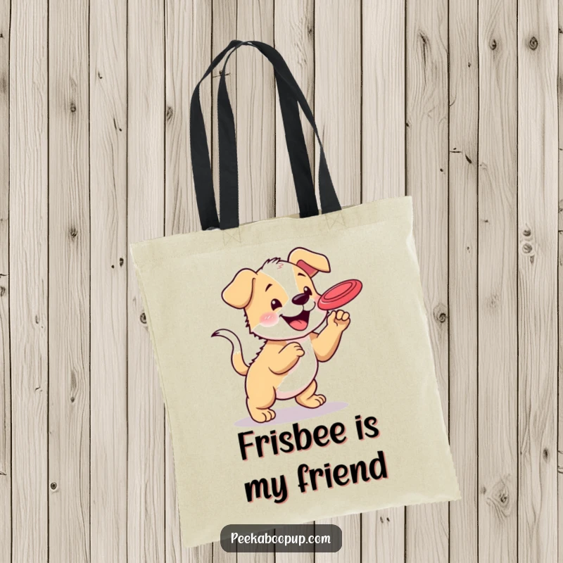 Funny tote bag with a happy puppy, tail wagging, jumping to catch a frisbee, perfect for carrying items with canine flair.