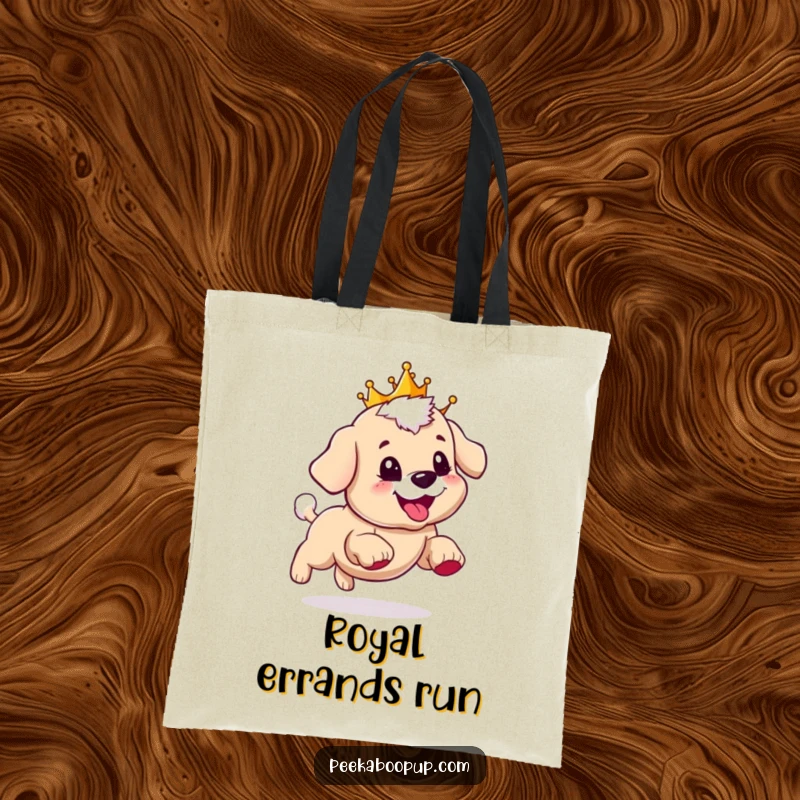 Funny tote bag featuring a puppy wearing a crown, happily and humorously chasing its tail with a big grin.