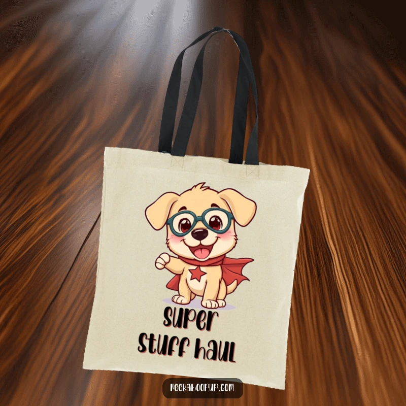 Funny tote bag featuring a happy puppy in a cape striking a funny superhero stance, ideal for shopping.